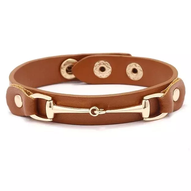 AWST INT'L VEGAN LEATHER BRACELET WITH GOLD TONE SNAFFLE BIT