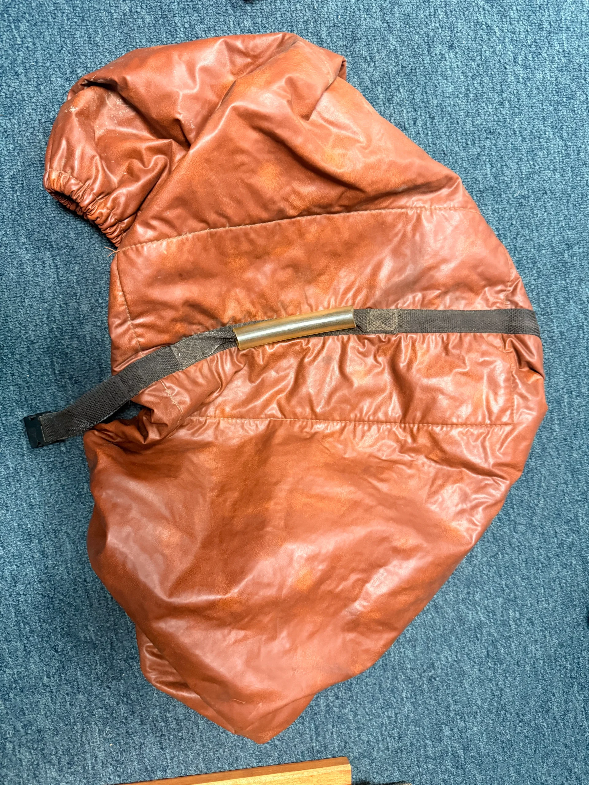 Brown vinyl English saddle cover