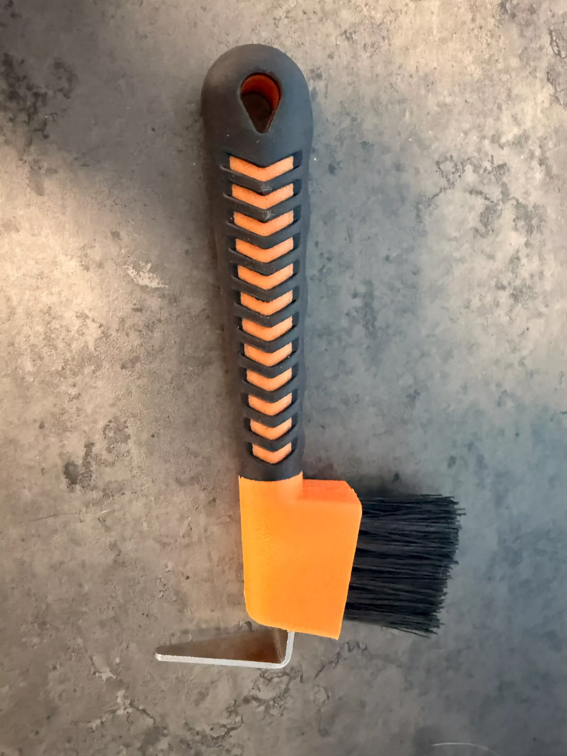Orange black hoof pick with brush