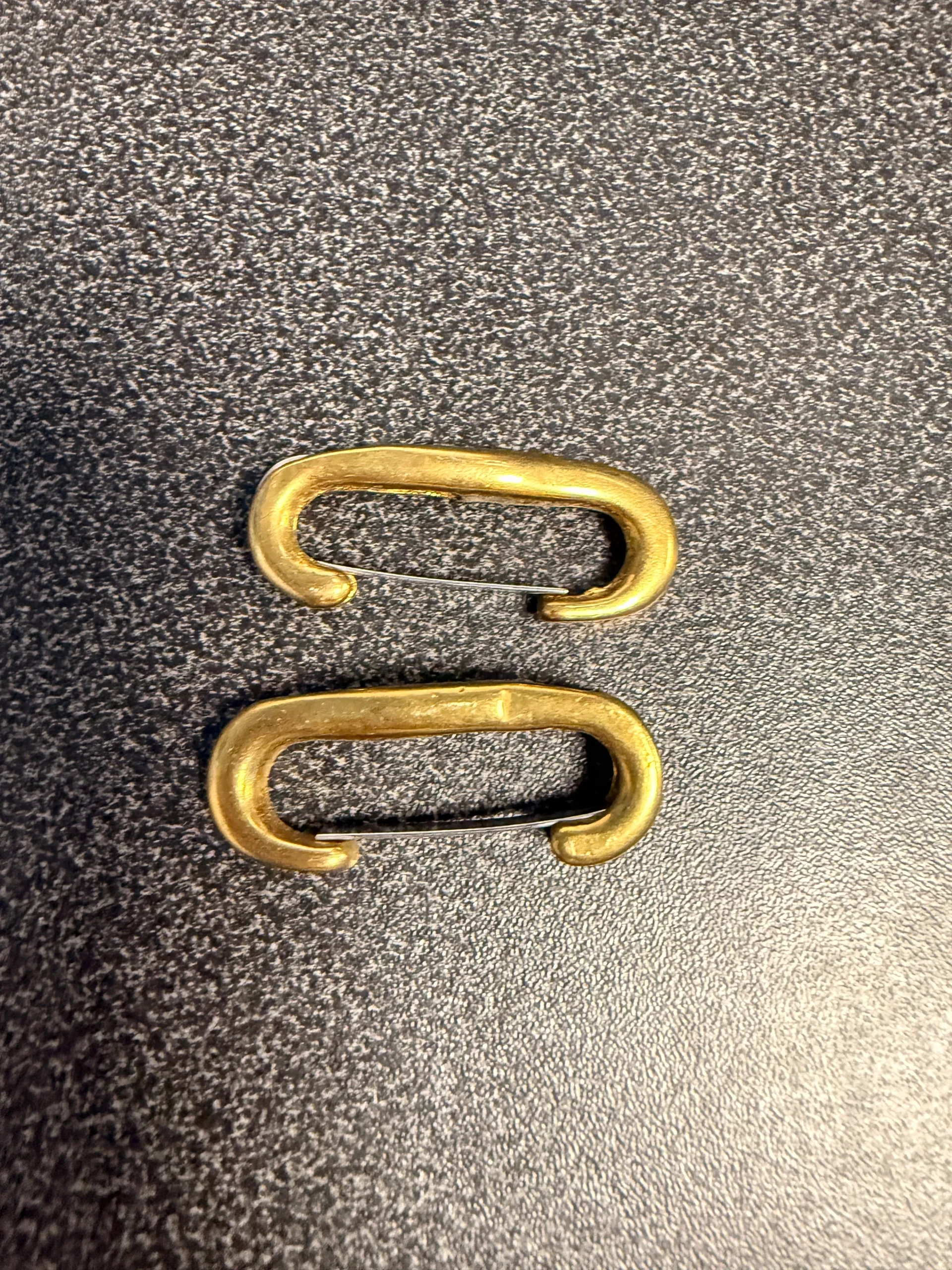 pair brass curb clips